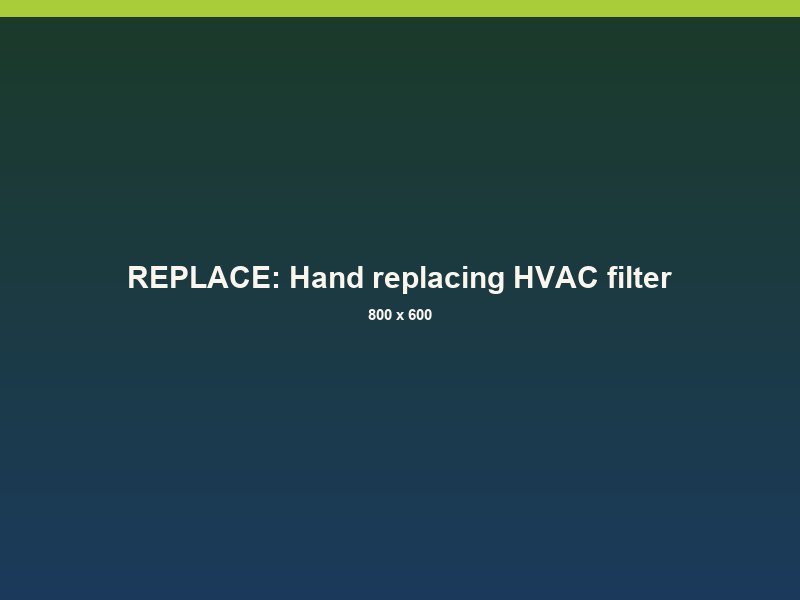 A hand replacing an HVAC air filter